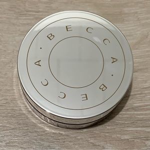 Becca hydra-mist setting and refreshing powder golden brown